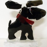 Elisabet Linna-Persson-Glassdog on stone base with bandanna